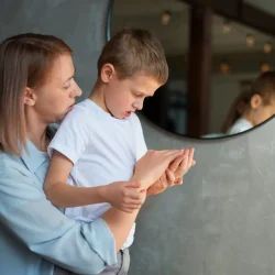 mother-taking-care-her-autistic-son-home_23-2150266571 mother-taking-care-her-autistic-son-home_23-2150266571